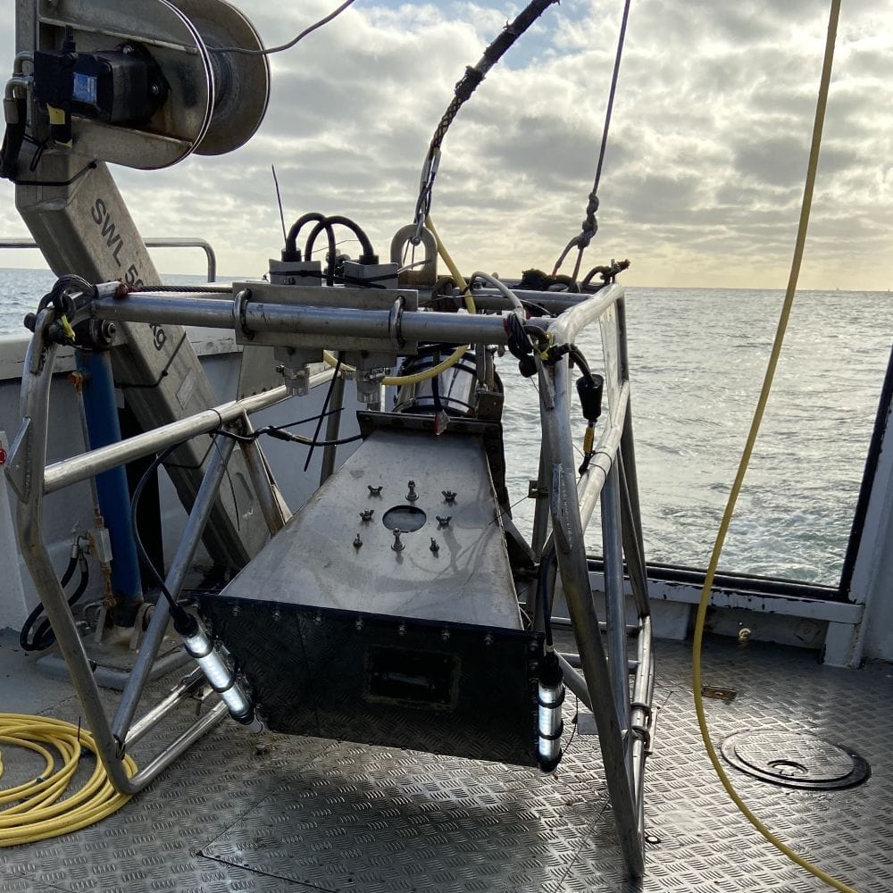 Picture of a Landing and retrieval system being deployed over the side of a boat in the Celtic Sea
