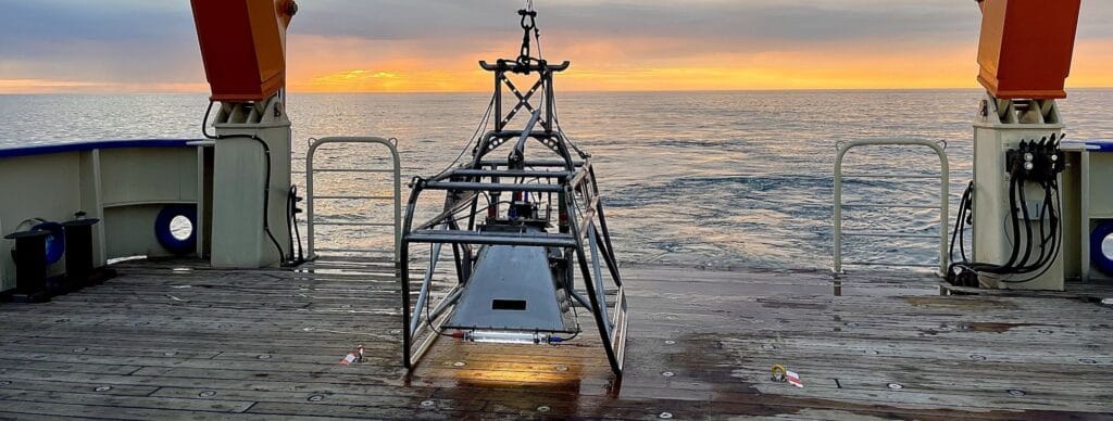Picture of Ocean Ecology's Freshwater lens camera system ready to be deployed over the side of a boat